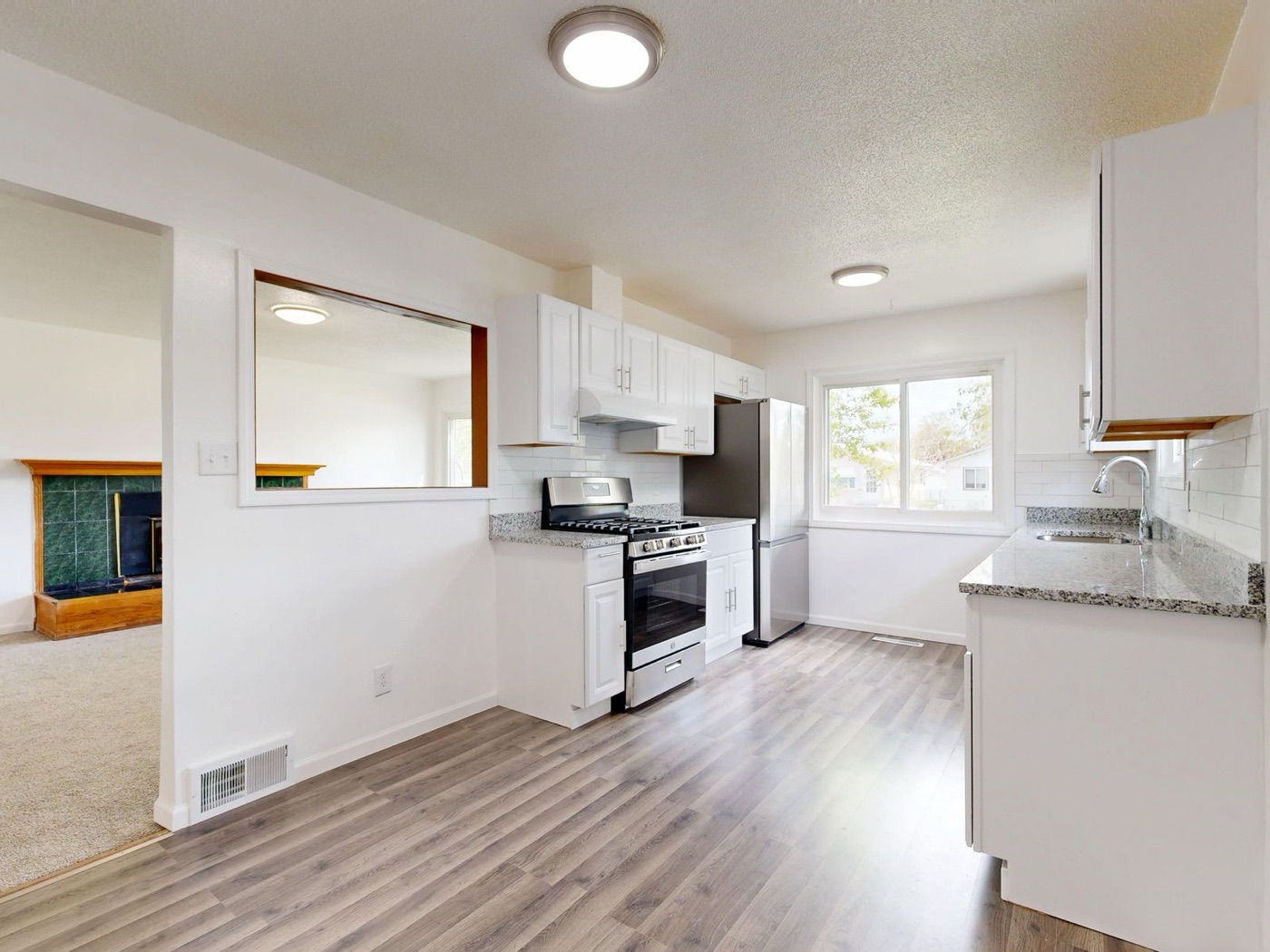 Newly renovated kitchen with white cabinets